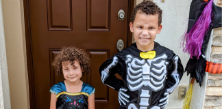 Hospitality & Halloween: Connecting With Our Neighbors | Dr. Bob Two kids pose for a picture in their Halloween costumes