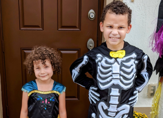 Hospitality & Halloween: Connecting With Our Neighbors | Dr. Bob Two kids pose for a picture in their Halloween costumes
