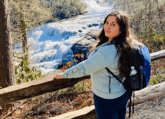 MMC Contributor Rachel Santos at a waterfall in Asheville, NC