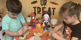 Decorating pumpkin cookies