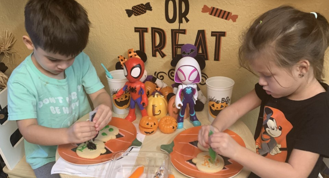 Children decorating cookies