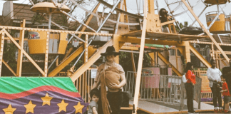Jacqueline at a carnival with her children