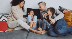 A family hanging out a laughing together