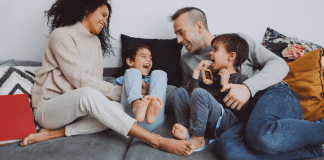 A family hanging out a laughing together