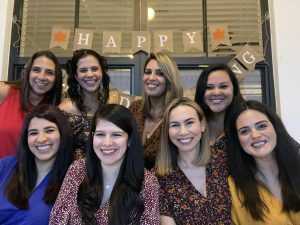 Image: A group of friends celebrating Friendsgiving