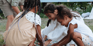 Candy Overload: 3 Tips for Managing Sugary Treats | Dr. Bob A group of children gather pieces of candy from a broken pinata