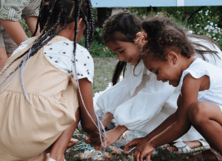 Candy Overload: 3 Tips for Managing Sugary Treats | Dr. Bob A group of children gather pieces of candy from a broken pinata