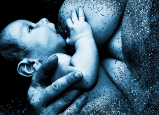 A mother breastfeeding her newborn baby