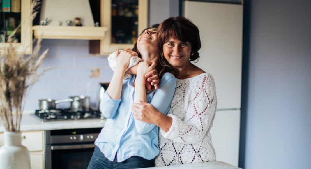Mom hugging child