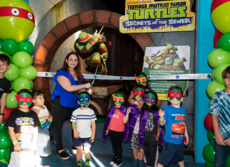 Teenage Mutant Ninja Turtles: Secrets of the Sewer | An Exhibit for all Ages Several children participate in the ribbon cutting ceremony at Miami Children Museum's TMNT Secrets of the Sewer Exhibit