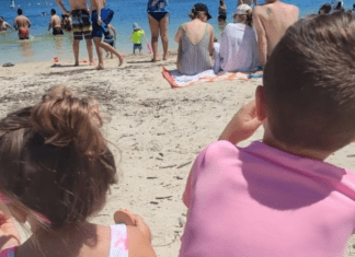 Two kids enjoying a day at the beach