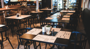 Tables, chairs, and menus inside a restaurant