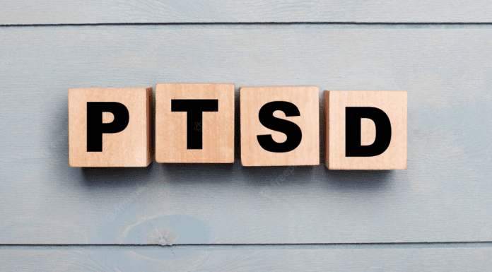 Letter tiles spelling out PTSD