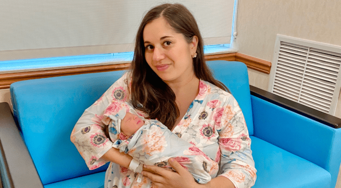 My Birthing Story: How I Overcame My Fear Of Having Children Rachel, holding her newborn daughter