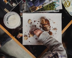 A young child eating breakfast