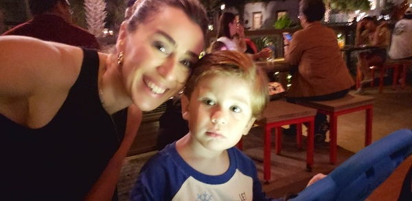 Sandra and her son enjoying some nighttime entertainment