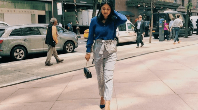 A woman walking to work in the city