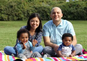 Foster mom Alejandra Fernandez with her husband and children