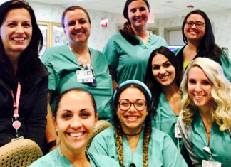 Dianna pictured with several of her co-workers