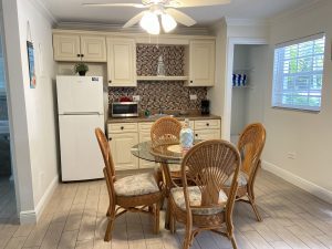 A full kitchen and dining area