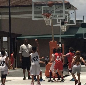 Boys playing basketball