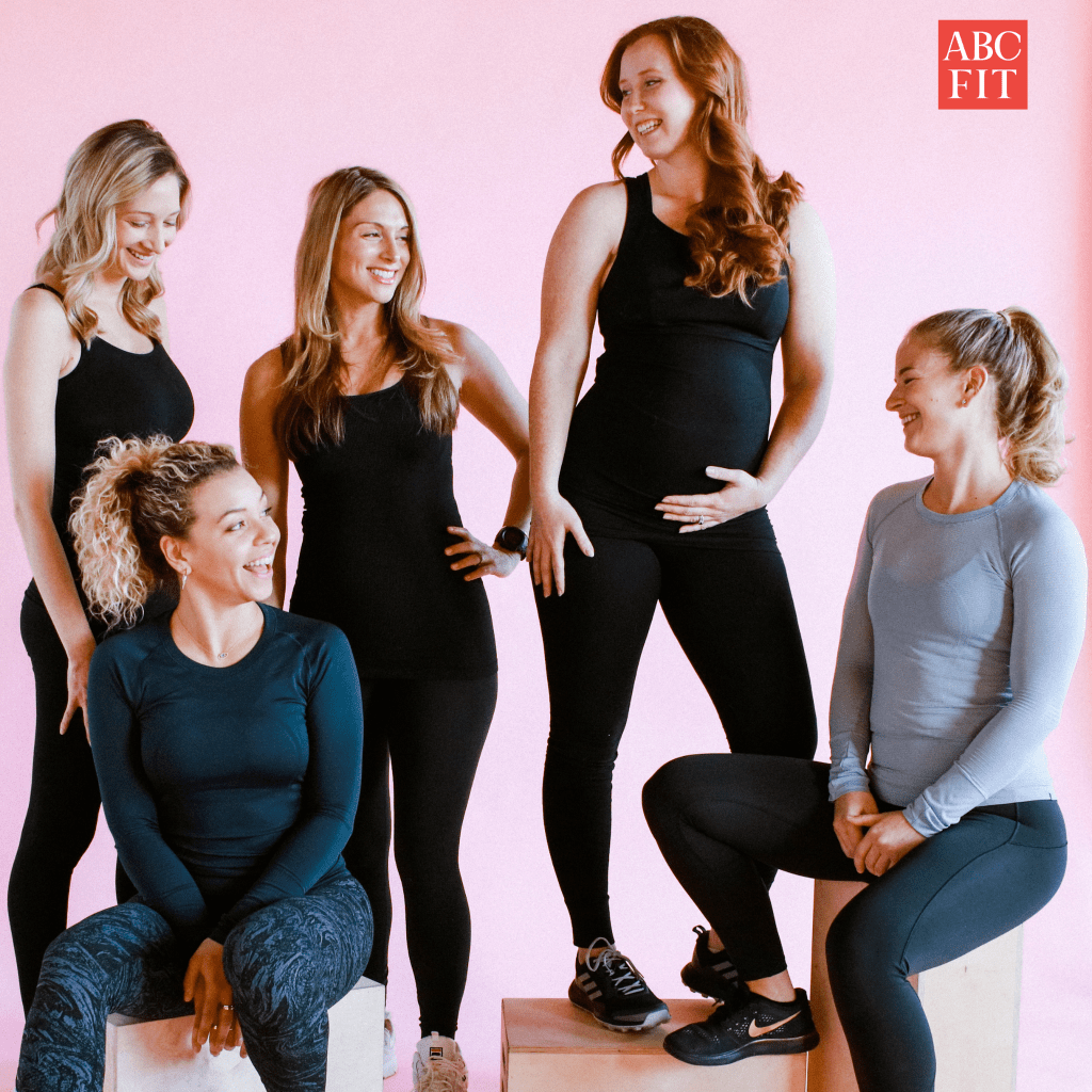 A group of women in workout gear representing ABC Fit Collective which focuses on fitness for moms