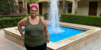 Natasha, standing in front of a fountain