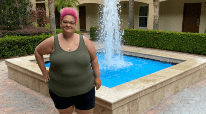 Miami Mom Collective Welcomes MIA Mom Natasha Arias Natasha, standing in front of a fountain