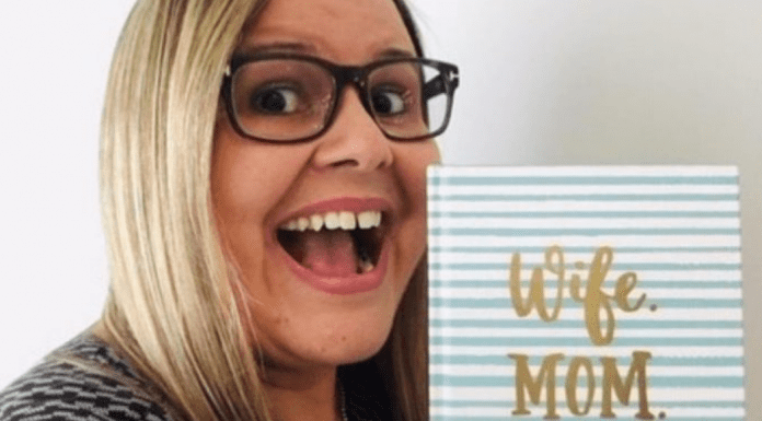 Vanessa, holding a journal that reads "Wife. Mom. Boss."