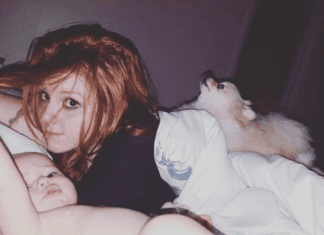 Co-Sleeping: How to Get Your Kids Out of Your Bed Mom sleeping with her baby and dog