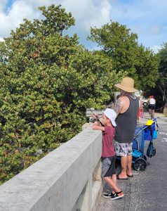 A family fishes from a pier in Islamorada