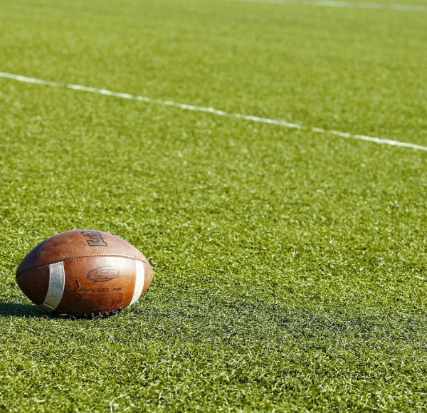 Image: A football on the field