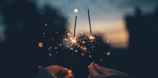 Blessings of 2021: A Season Not Wasted Image: Two hands holding sparklers (Blessings of 2021: A Season Not Wasted Kristin Parke Contributor Miami Mom Collective)