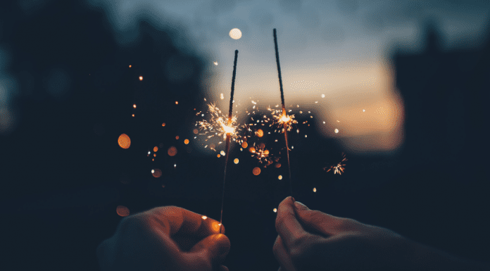 Image: Two hands holding sparklers (Blessings of 2021: A Season Not Wasted Kristin Parke Contributor Miami Mom Collective)
