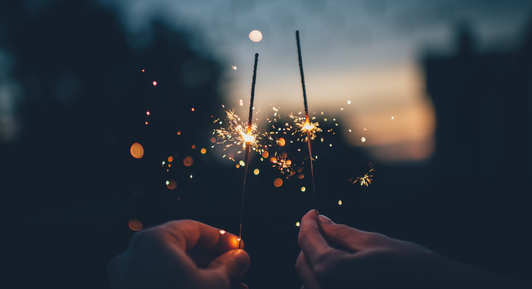 Image: Two hands holding sparklers (Blessings of 2021: A Season Not Wasted Kristin Parke Contributor Miami Mom Collective)