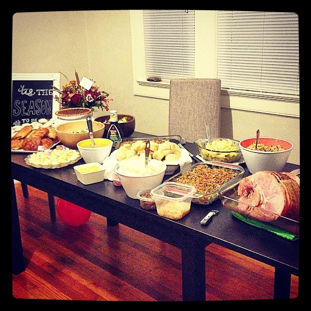 Image: A Thanksgiving buffet table with ham and sides