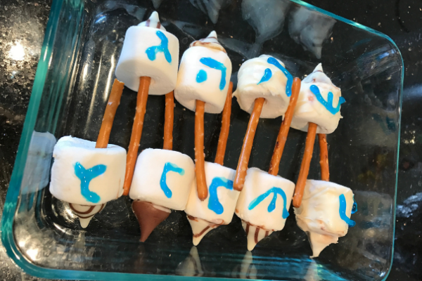 Image: A tray of homemade Chanukah dreidel pops