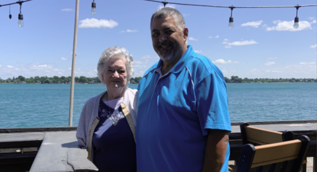 Image: Holly's husband with his mom (National Mother-in-Law Day: She Truly Is a Mother-in-Love Holly Farver Contributor Miami Mom Collective)