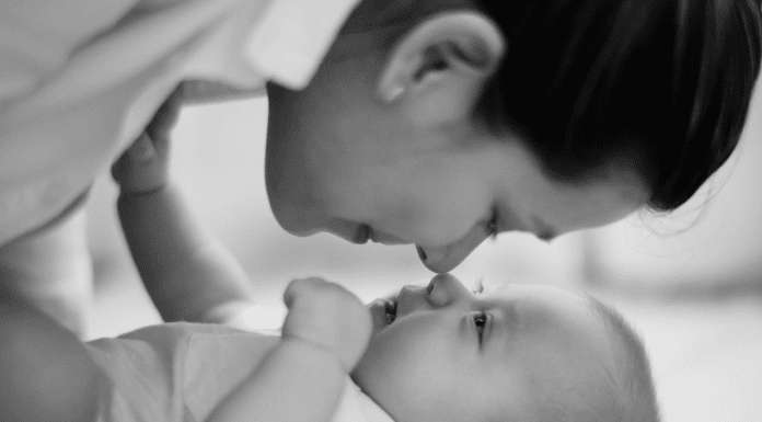 Image: A mom rubbing noses with her baby (6 Tips for the Fourth Trimester Kristin Parke Contributor Miami Mom Collective)
