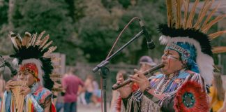 Image: Indigenous people playing traditional instruments