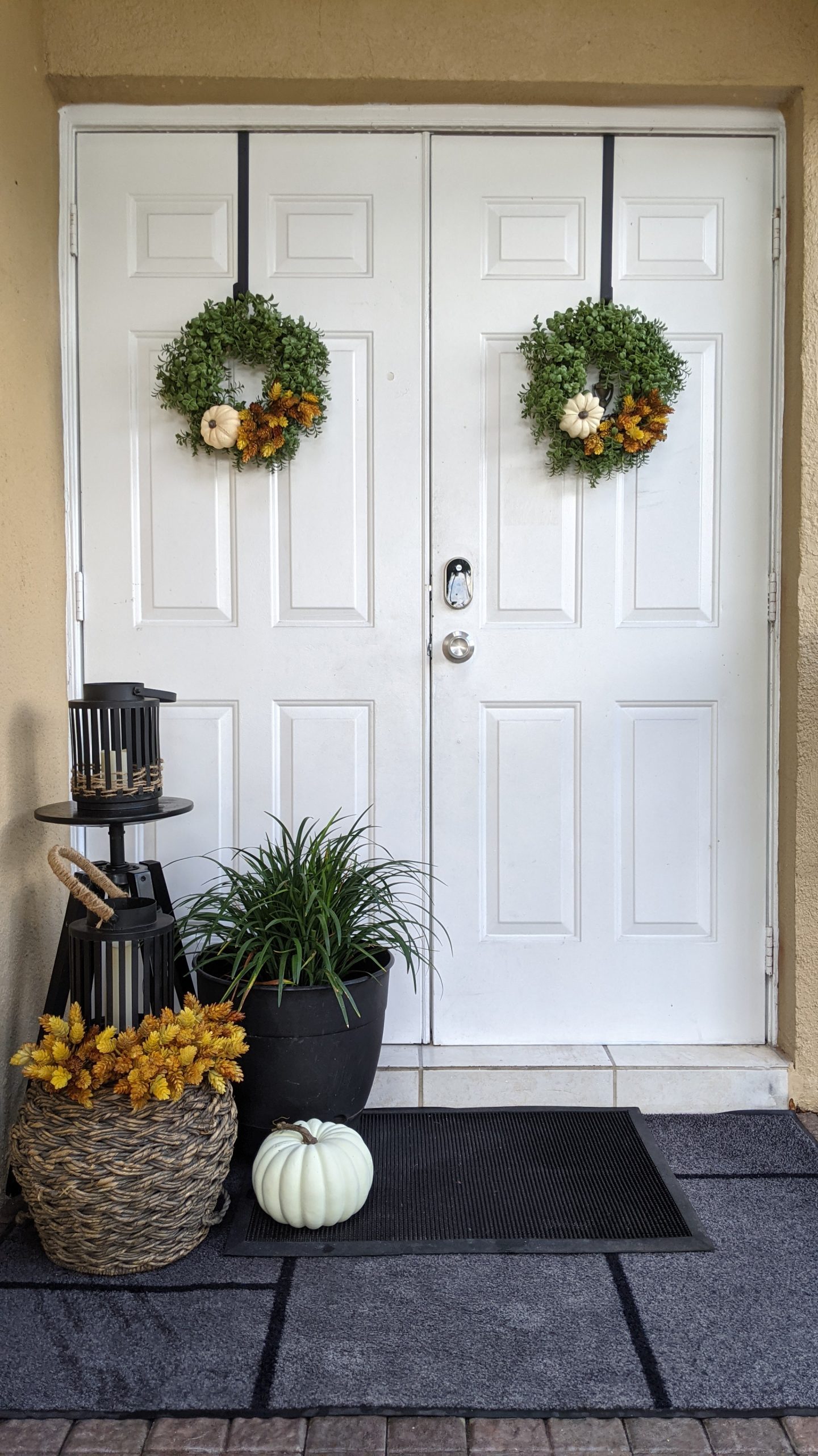 Image: Fall wreaths and decor outside Rachel's front door (Get the Fall Feeling in Miami Rachel Hulsund Contributor Miami Mom Collective)