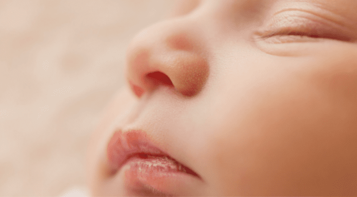 Baby Safety Month: Helpful Tips for Keeping Your Little One Safe A picture of a sleeping baby's face (Baby Safety Month: Helpful Tips for Keeping Your Little One Safe Dianna Hill Contributor Miami Mom Collective)