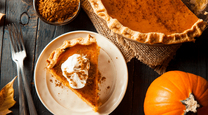 8 Things to Add to Your Fall Bucket List This Year Image: A slice of pumpkin pie on a festive table