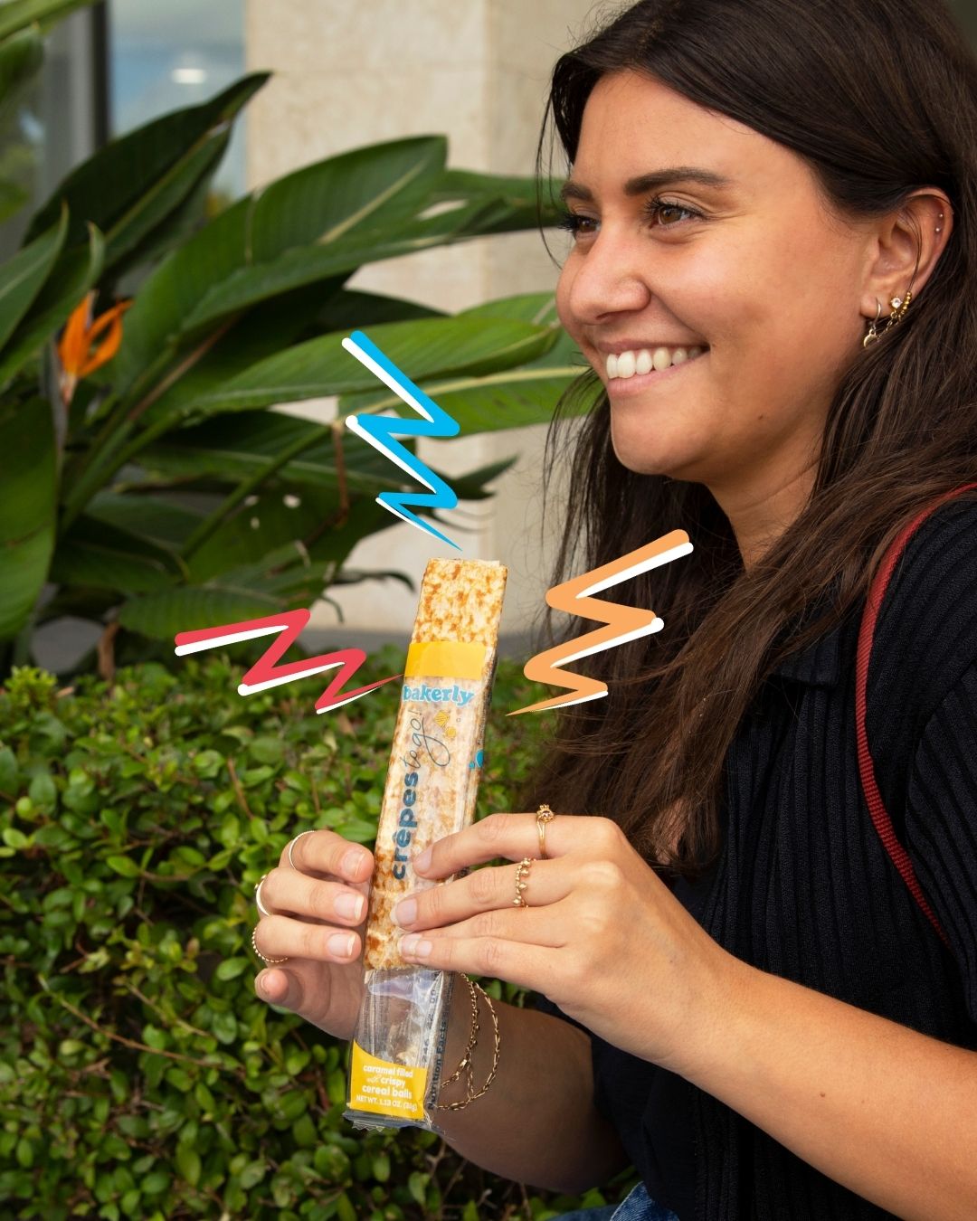 A woman enjoying crepes to-go from bakerly (Snack Time: Unwrap et Voilà With These Snacks From Bakerly Lynda Lantz Contributor Miami Mom Collective)