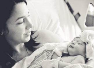 Aymee with her infant daughter (Got Milk? My Breastfeeding Journey With 3 Kids Aymee Blanco Contributor Miami Mom Collective)