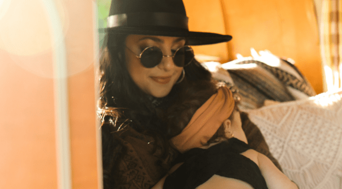 Image: Jacqueline snuggling her toddler-aged daughter