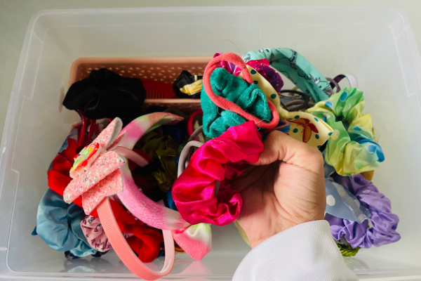 A bin full of hair accessories