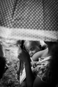 A woman breastfeeding her infant (Got Milk? My Breastfeeding Journey With 3 Kids Aymee Blanco Contributor Miami Mom Collective)