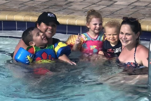 MMC Contributors Crystal Giraldo and Lorena Lougedo and their kids enjoying the pool (Lorena Lougedo Contributor Miami Mom Collective)