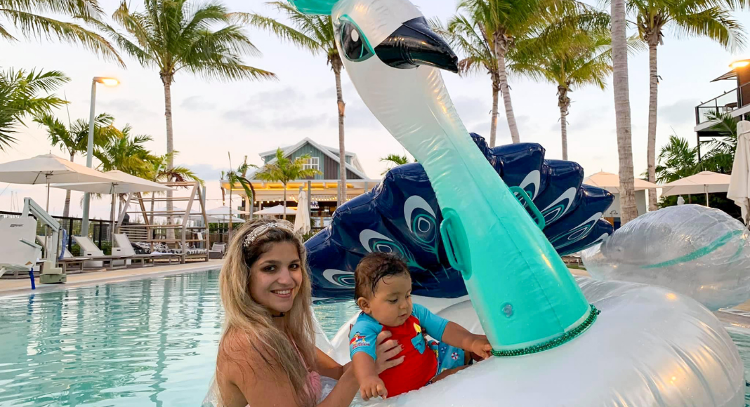 Bella and her son enjoying some pool time in the Keys